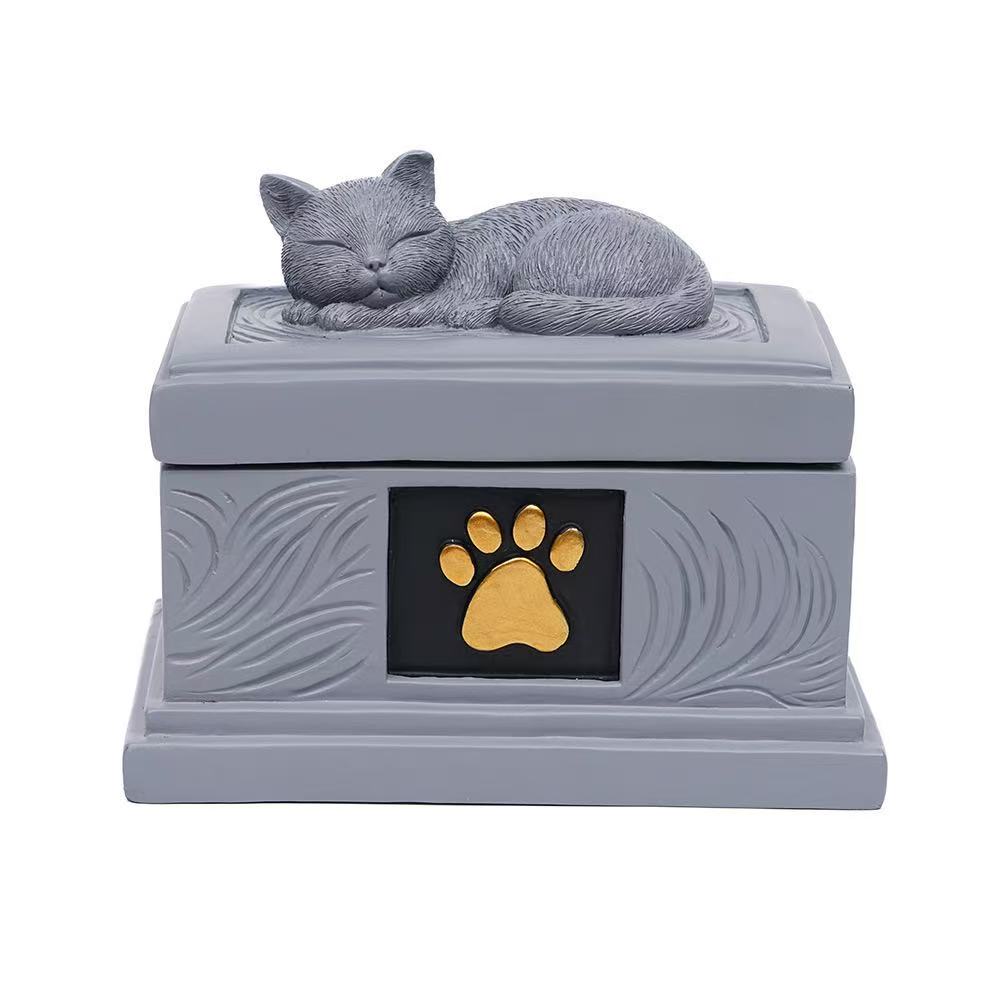 Sleeping cat pet memorial urn with gold paw detail