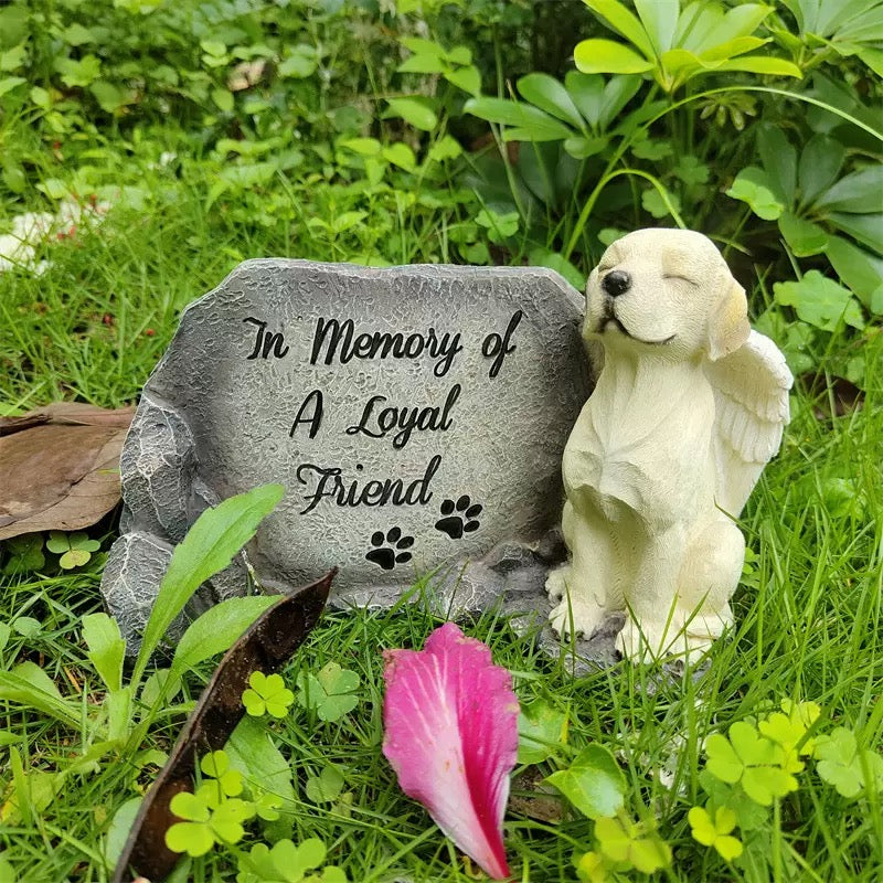 Winged dog angel memorial stone detail