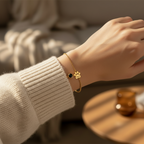 Model wrist wearing custom pet paw bracelet cleanly with natural light